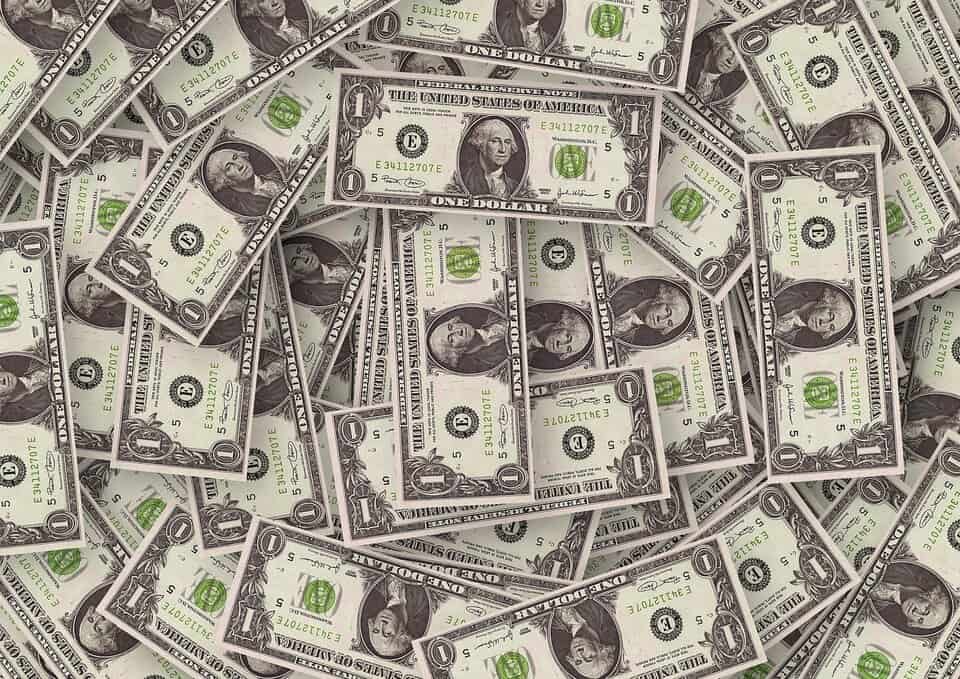 pile one dollar bills